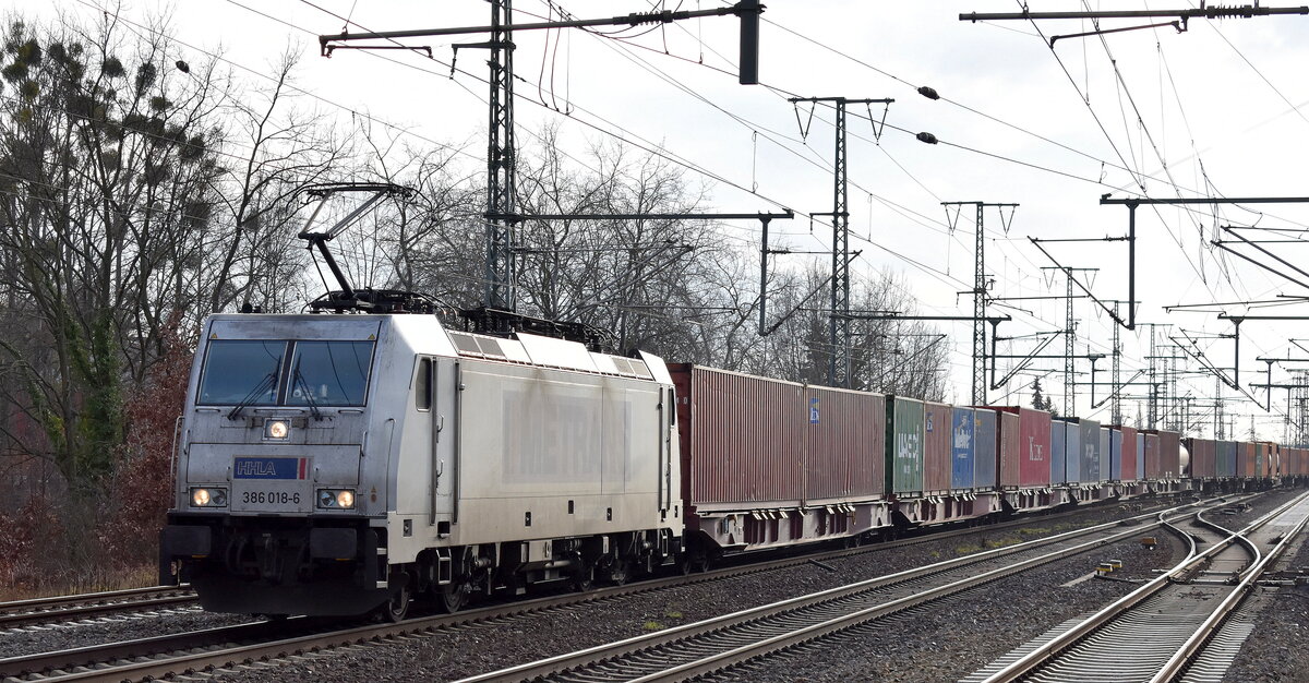 METRANS Rail s.r.o., Praha [CZ]  mit ihrer  386 018-6  [NVR-Nummer: 91 54 7386 018-6 CZ-MT] und einem Containerzug am 03.01.23 Durchfahrt Bahnhof Golm.