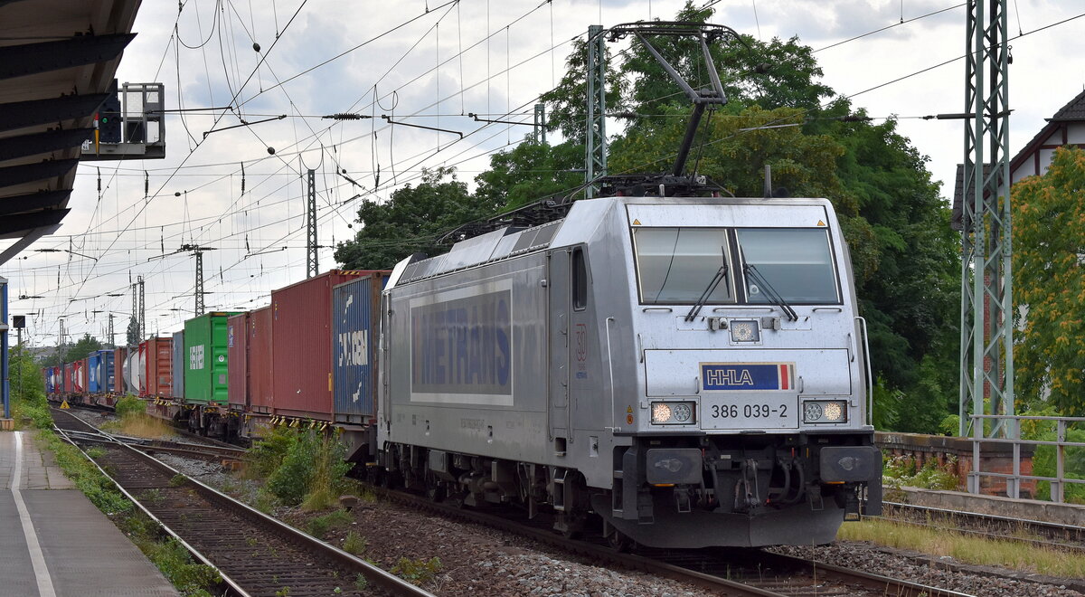 METRANS Rail s.r.o., Praha [CZ]  mit ihrer  386 039-2  [NVR-Nummer: 91 54 7386 039-2 CZ-MT] und einem Containerzug am 19.07.23 Höhe Bahnhof Magdeburg-Neustadt.