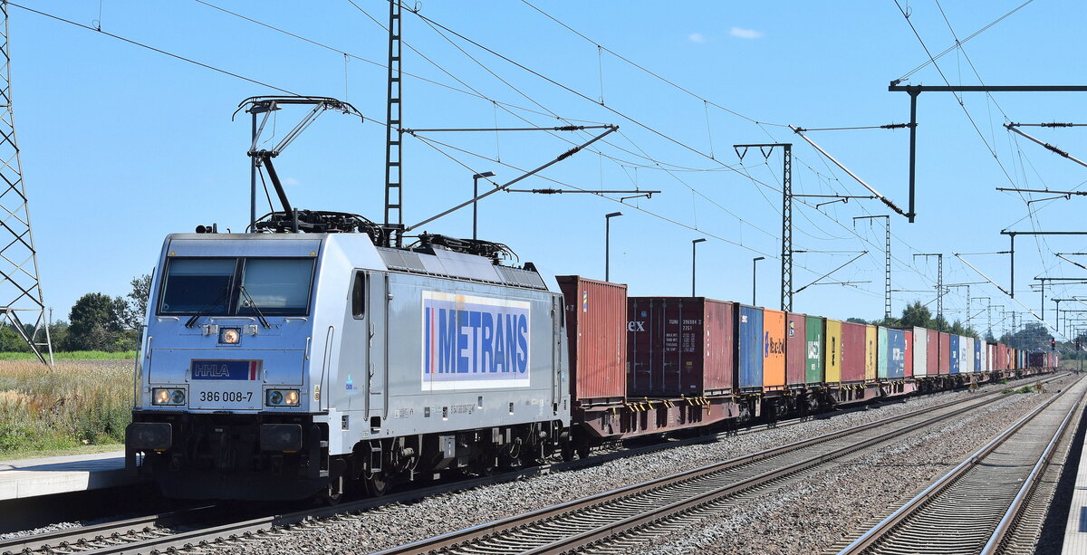 METRANS Rail s.r.o., Praha [CZ] mit ihrer  386 008-7  [NVR-Nummer: 91 54 7386 008-7 CZ-MT] und einem Containerzug am 06.08.24 Durchfahrt Bahnhof Rodleben.