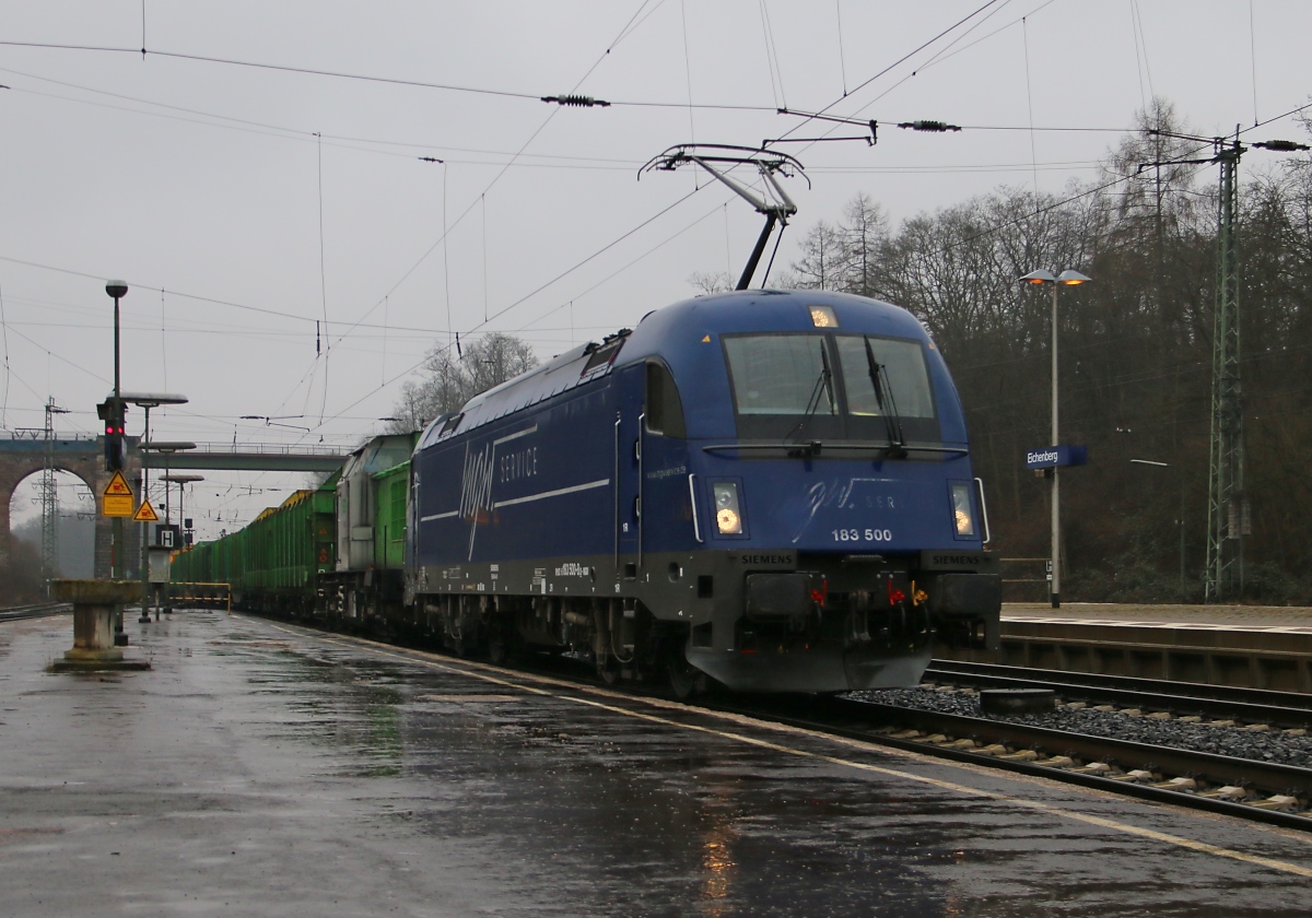 MGW 183 500 mit der Wagenlok 202 787-8 der SETG und einem leeren Holzzug in Fahrtrichtung Norden. Aufgenommen am 14.03.2015 in Eichenberg.