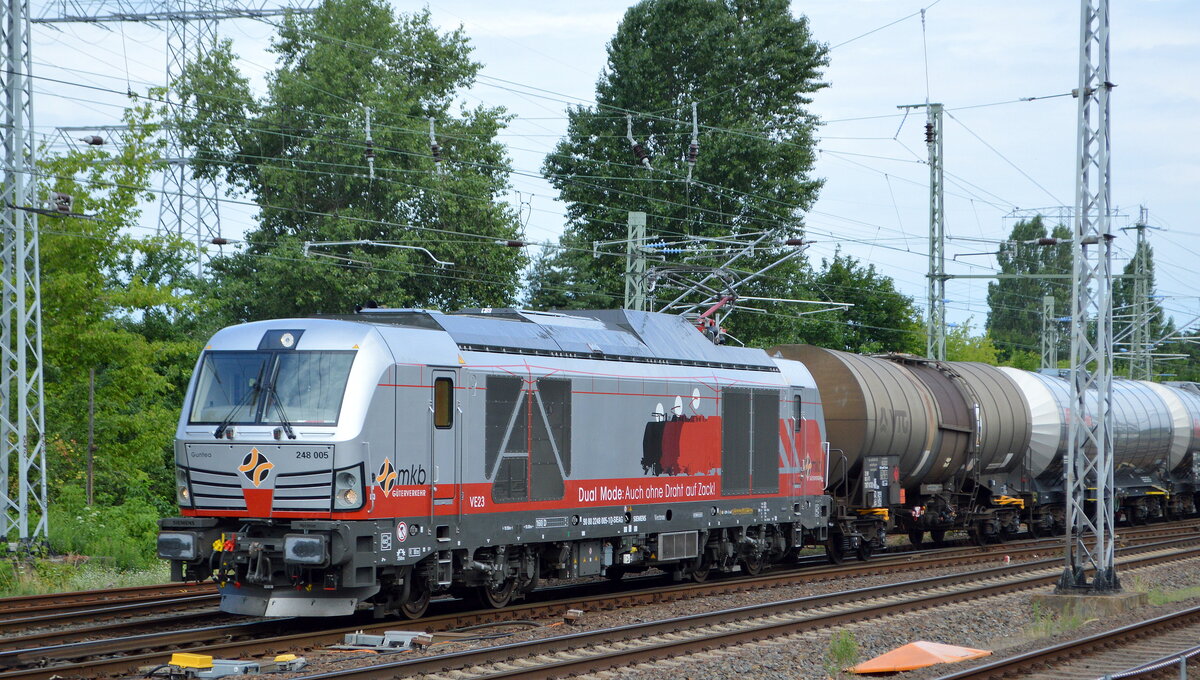 Mindener Kreisbahnen GmbH, Minden [D] mit der Dual Vectron  248 005 / VE 23  Name: Guntea (NVR:  90 80 2248 005-1 D-SIEAG ) und Kesselwagenzug am 28.07.21 Berlin-Springpfuhl.