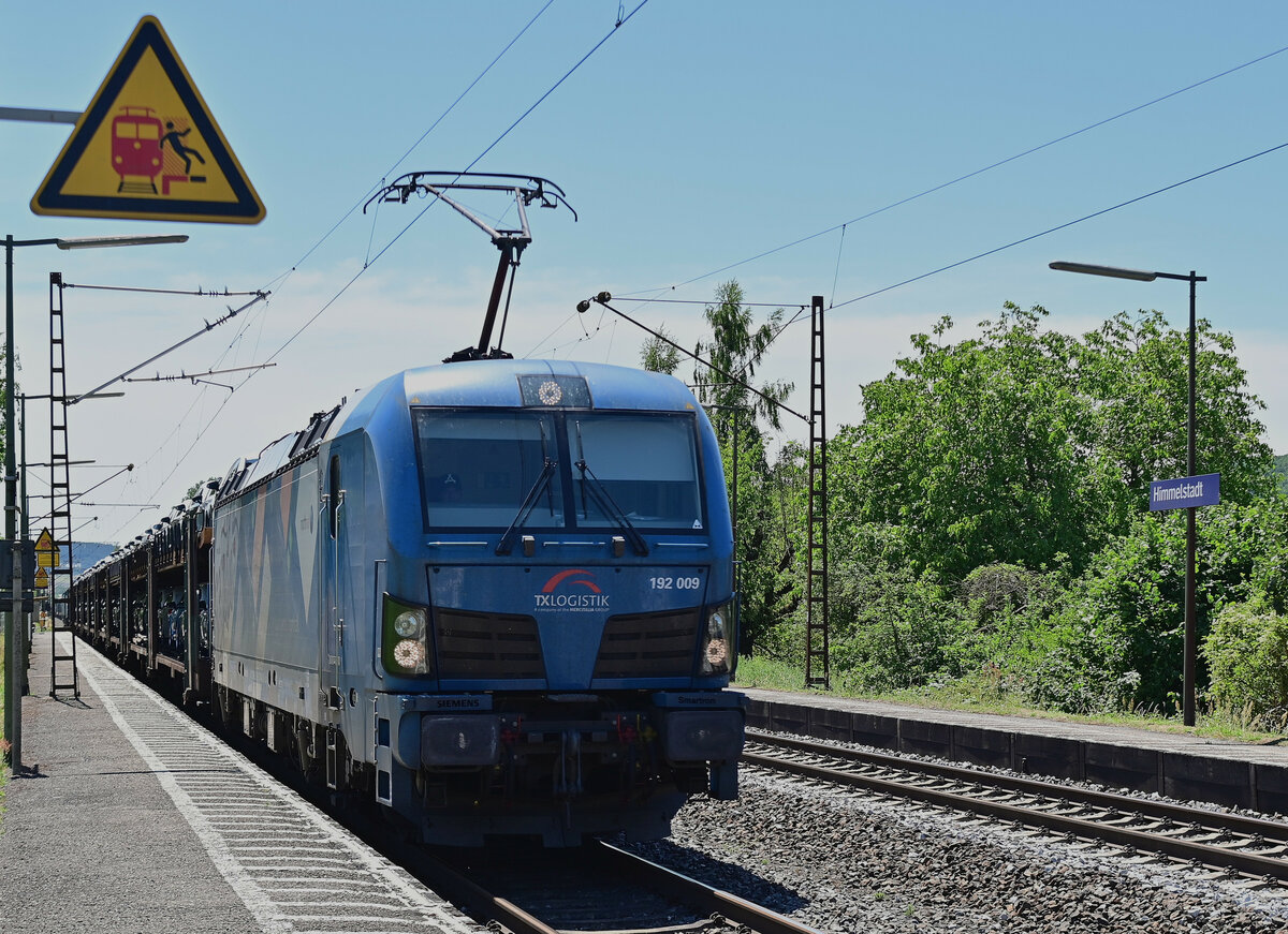 Mit einem Audizug aus Ingolstadt am Haken ist die 192 009 hier bei der Durchfahrt in Himmelstadt abgelichtet, hier ist sie gen Gemünden unterwegs. 28.6.2022