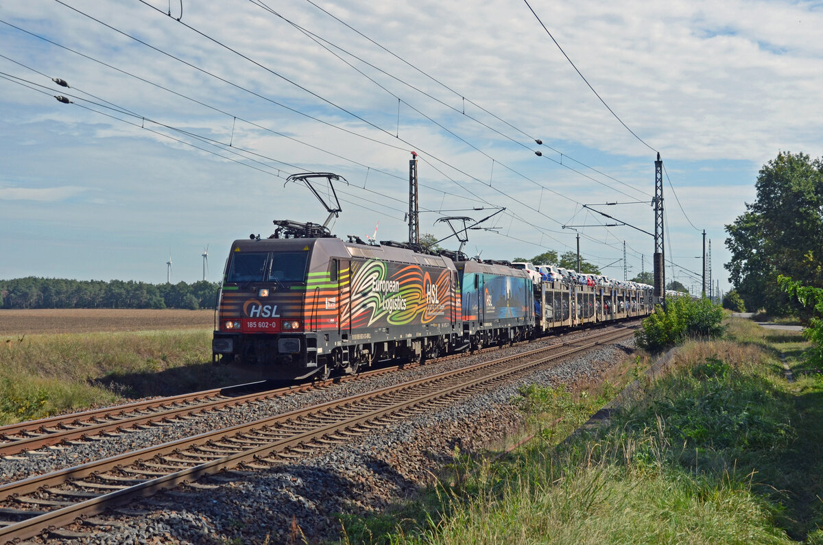 Mit einem BLG-Autozug rollten 185 602 und 185 601 der HSL am 17.09.23 durch Wittenberg-Labetz Richtung Dessau.