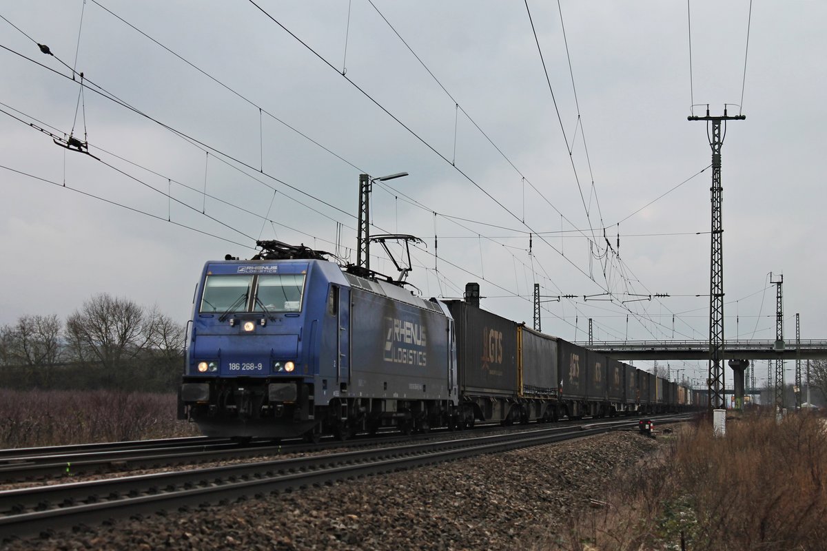 Mit einem  GTS -Containerzug aus Piacenza fuhr am Mittag des 19.02.2018 die RRL/XRAIL 186 268-9 nördlich von Müllheim (Baden) durchs Rheintal in Richtung Freiburg (Breisgau).