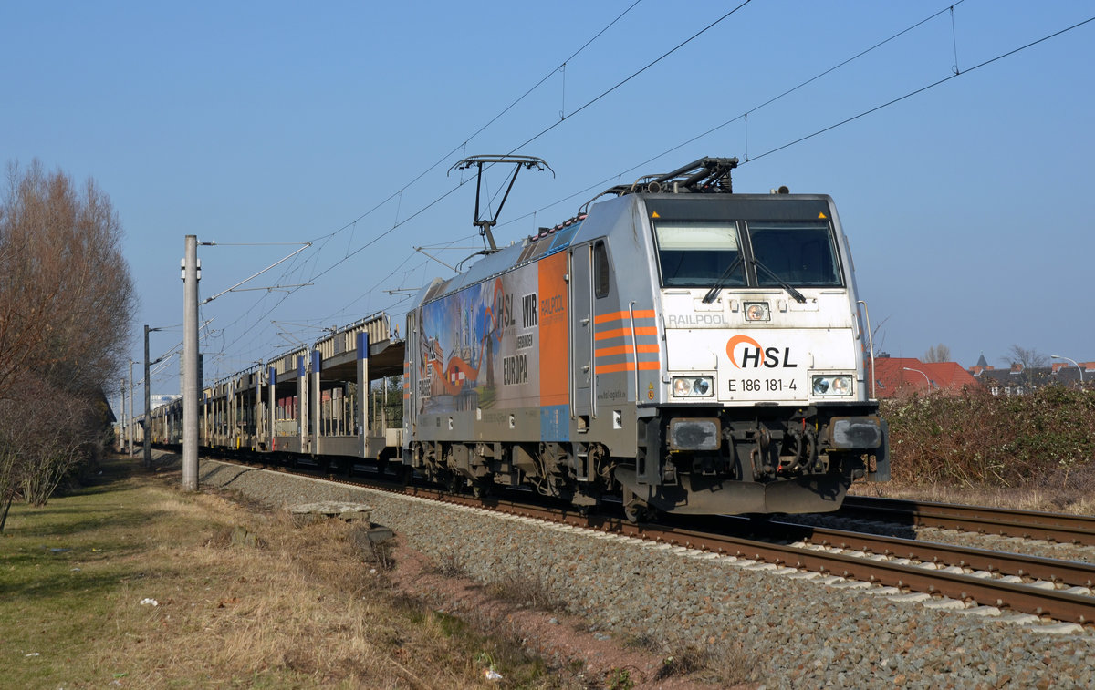 Mit einem leeren Autozug am Haken rollte 186 181 der HSL am 16.02.17 durch Greppin Richtung Leipzig.