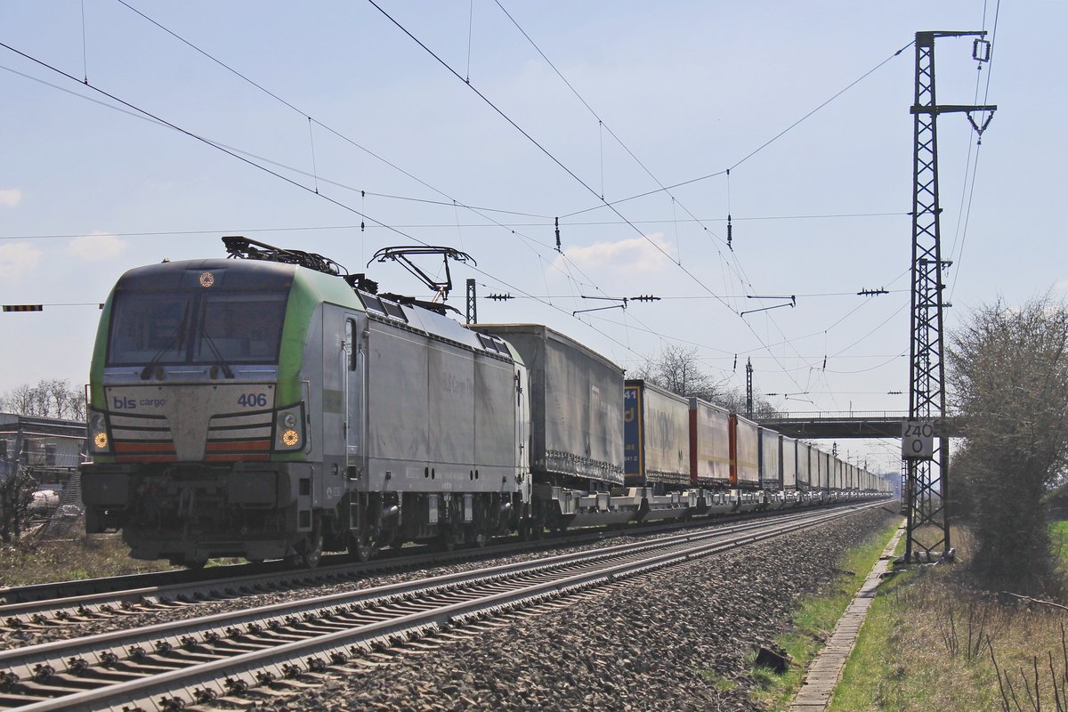 Mit einem  LKW Walter -KLV nach Zeebrugge fuhr am Nachmittag des 20.03.2019 die Re 475 406 bei der Fa. Jacoby in Auggen über die KBS 703 durchs Rheintal in Richtung Müllheim (Baden).