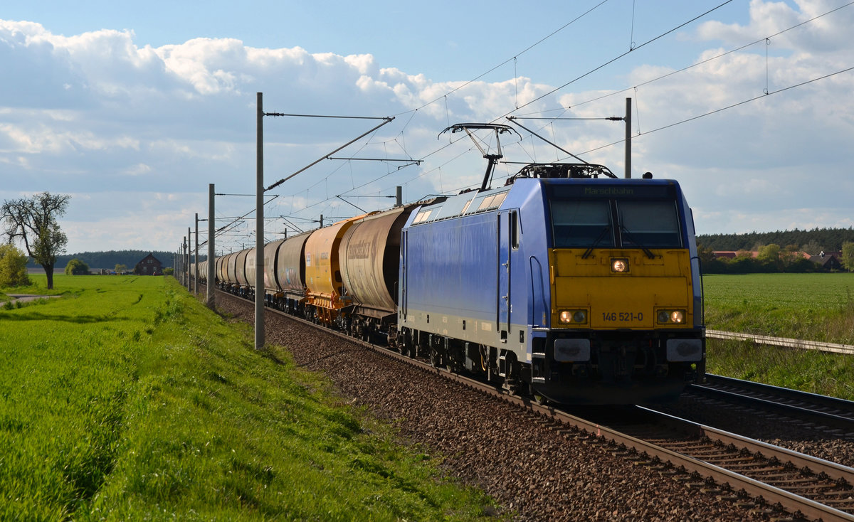 Mit einem Transcereal am Haken rollte die im Dienste der HSL stehende 146 521 am 29.04.17 durch Rodleben Richtung Roßlau.