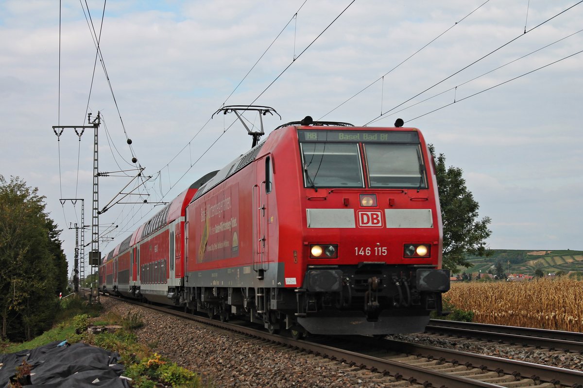 Mit einer RB (Offenburg - Basel Bad Bf) fuhr am Nachmittag des 04.09.2018 die Freiburger 146 115  Landkreis Breisgau-Hochschwarzwald  bei Müllheim (Baden) in Richtung des dortigen Bahnsteiges, um dort ihren nächsten Zwischenhalt einzulegen.