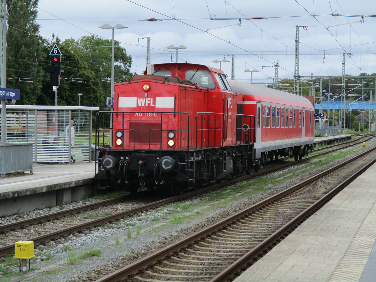 Mit einer Überführung von Mukran kam,am 13.September 2023,die WFL 203 118 durch Bergen/Rügen.