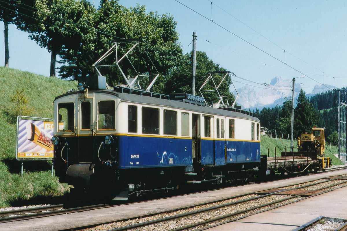 MOB: Bauzug mit dem De 4/4 28 bei einem Zwischenhalt in Saanenmöser im August 1994.
Foto: Walter Ruetsch