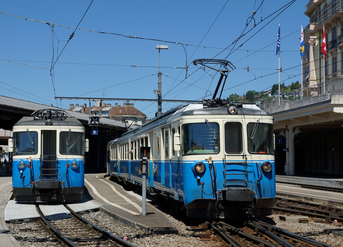 MOB: Die Regionalzüge nach Zweisimmen und von Les Avants mit den ABDe 8/8 4003  Bern  und ABDe 8/8 4004  Fribourg  beim Zusammentreffen in Montreux am 19. Juli 2016.
Foto: Walter Ruetsch