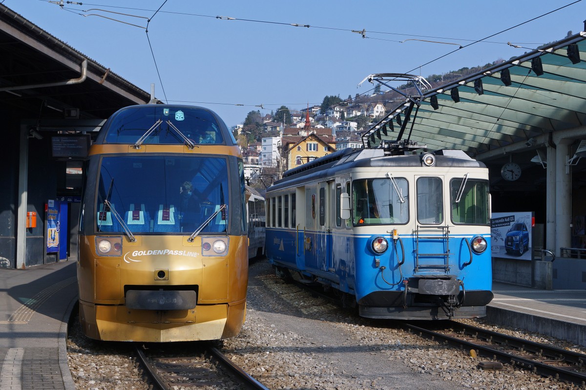 MOB: Noch können in Montreux bereits historische und moderne Züge gemeinsam im Planbetrieb bewundert werden. Moderner Steuerwagen der GOLDENPASSLINE neben dem ABDe 8/8 4003  BERN  aus dem Jahre 1968 und vor der Ausrangierung stehend am 19. März 2015.
Foto: Walter Ruetsch