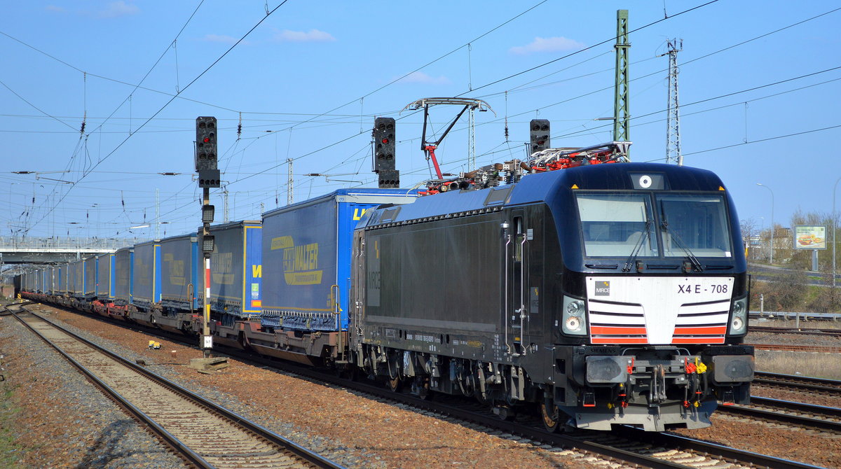 MRCE Dispo  X4 E - 708  [NVR-Number: 91 80 6193 708-5 D-DISPO] unklar ob sie für TXL, DB Cargo oder Mercitalia Rail S.r.l nun aktuell im Einsatz ist mit der Ganzzug-Leistung LKW-Walter Trailer ab Rostock am 03.04.19 Durchfahrt Bf. Flughafen Berlin-Schönefeld.
