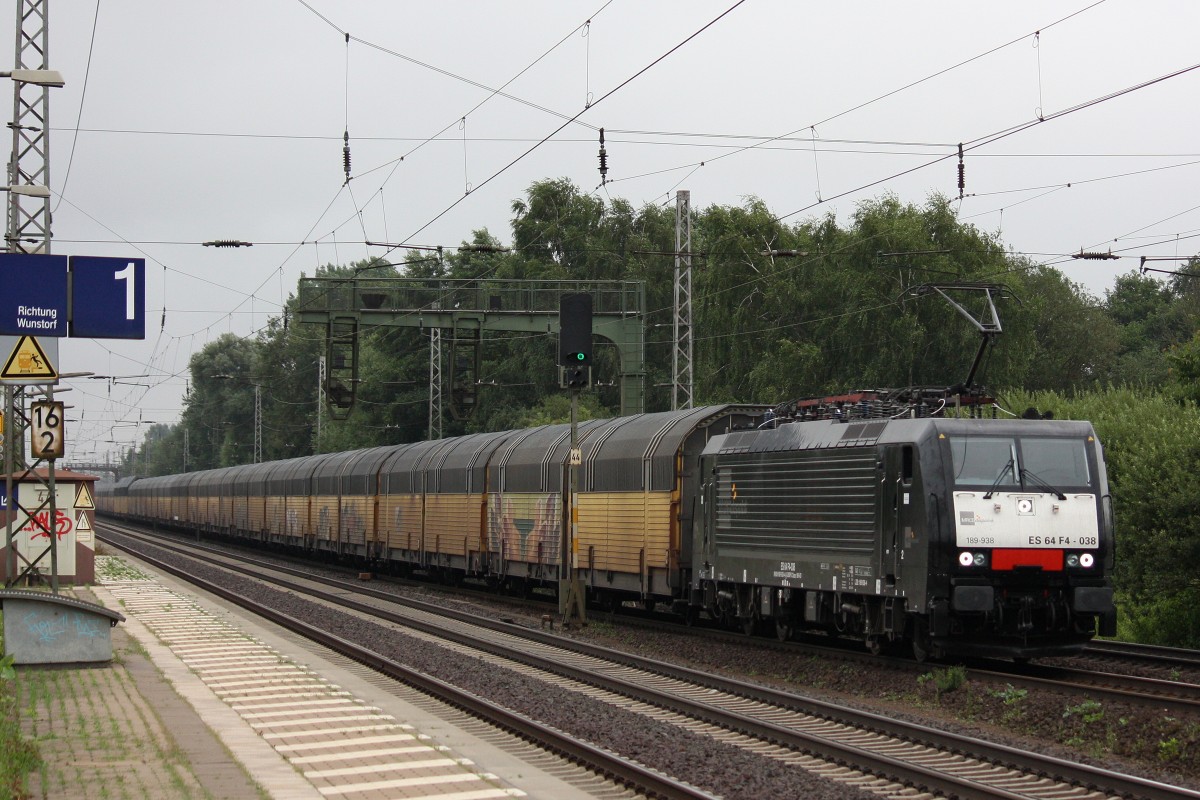 MRCE Dispolok/TXL ES 64 F4-038 am 8.8.13 mit einem Autozug in Dedensen-Gmmer.
