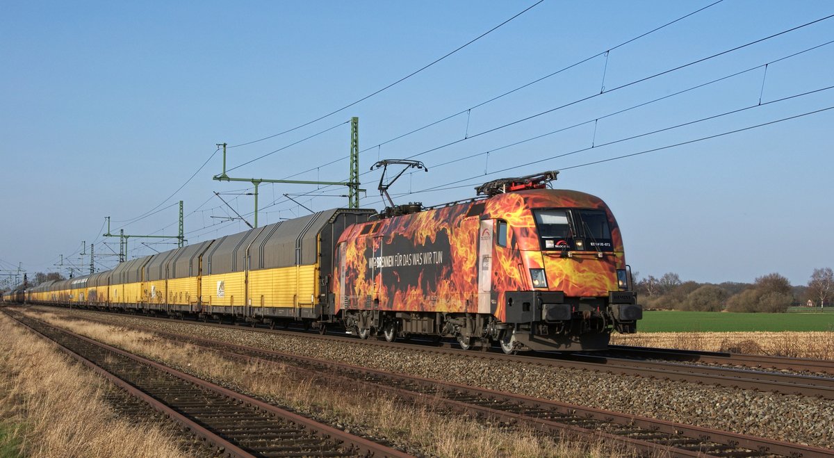 MRCE ES U2 - 072 (182 572)  Wir brennen f�r das was wir tun , an TXL vermietet, zieht einen ARS-Altmann-Autotransportzug am 16.03.17 bei Diepholz in Richtung Osnabr�ck.