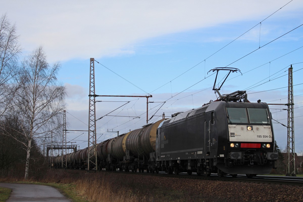 MRCE/CFL Cargo 185 554 am 15.2.14 mit einem Kesselzug in Dedensen-Gümmer.