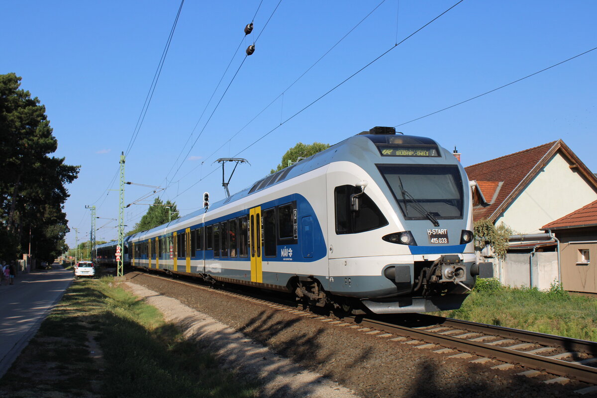 M�V-START 415 033 + 415 03318 als IR 18503  D�li ← Parti  von Balatonszentgy�rgy nach Budapest-D�li, am 29.07.2026 in Si�fok.