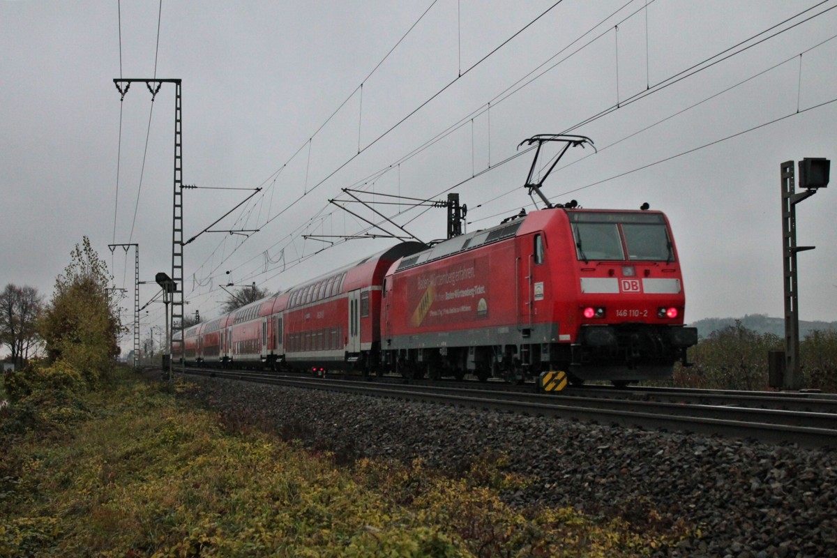Nachschuss am 22.11.2013 auf 146 110-2  Müllheim (Baden) , als sie mit einem RE nach Offenburg den Bahnhofsbereich von Müllheim (Baden) verlässt.