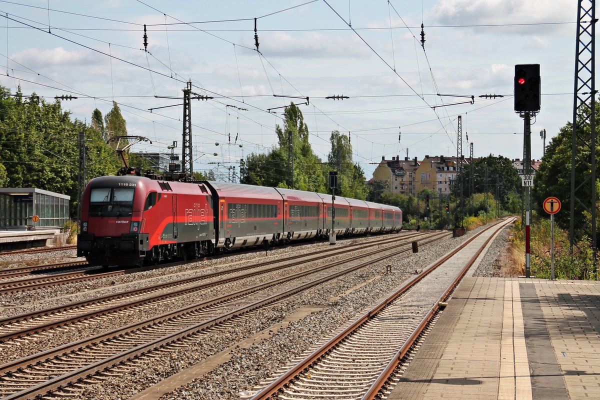 Nachschuss am 25.08.2015 auf 1116 231, als sie ihrern Railjet durch München Heimeranplatz in Richtung Ostbahnhof schiebte.