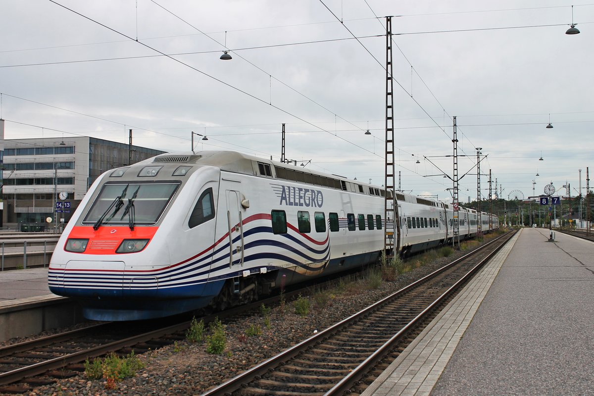 Nachschuss am Morgen des 08.07.2019 auf Sm6 7151 (3 890 001-0), als dieser als AE ___ (Helsinki - St. Petersburg) aus dem Startbahnhof in Richtung Helsinki Pasila fuhr.