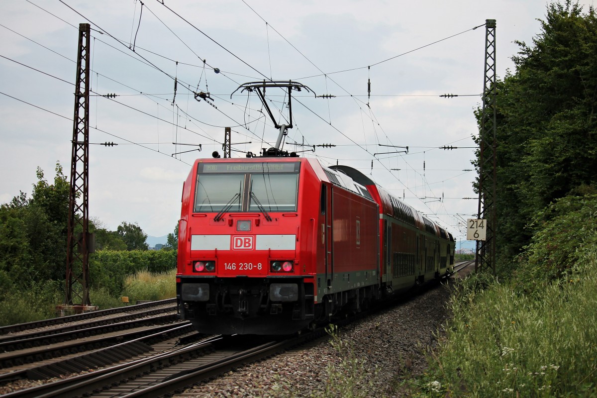 Nachschuss auf 146 230-8 am 12.07.2014, als dieses mit einer RB nach Freiburg (Brsg) Hbf am Abzweig Leutersberg ihrem vorletzten Zwischenhalt in Freiburg St. Georgen entgegen fährt.