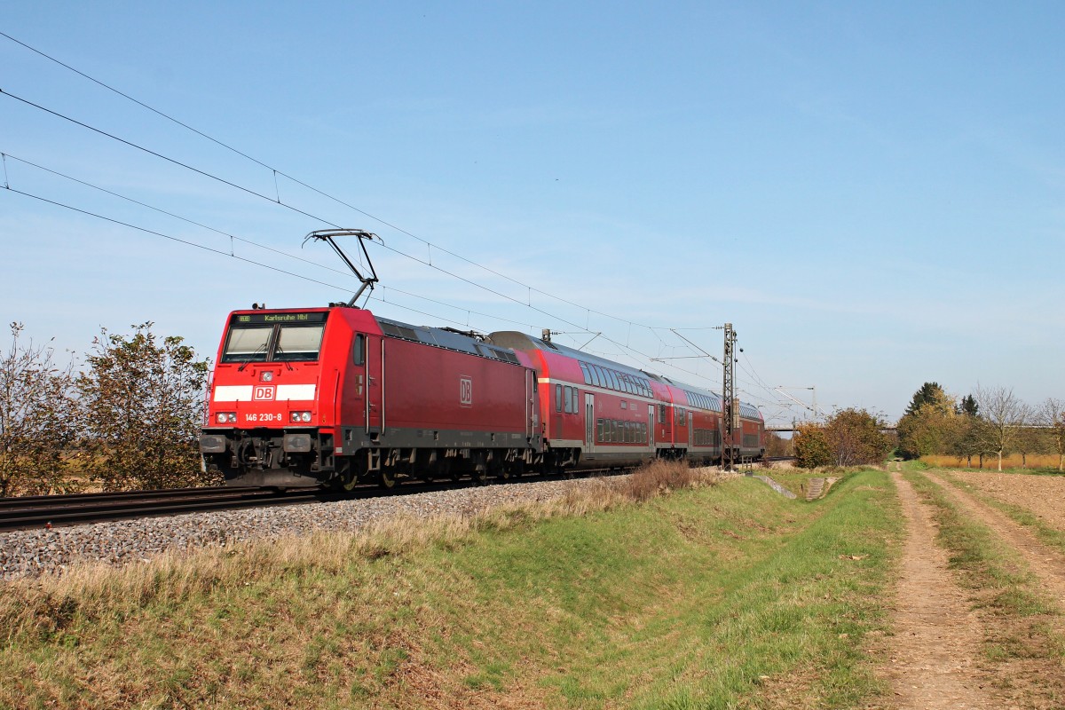 Nachschuss auf 146 230-8  Radolfszell  am 31.10.2014 mit der RB (Neuenburg (Baden) - Karlsruhe Hbf) bei Hügelheim und fuhr ihrem nächsten Zwischenhalt in Buggingen entgegen.