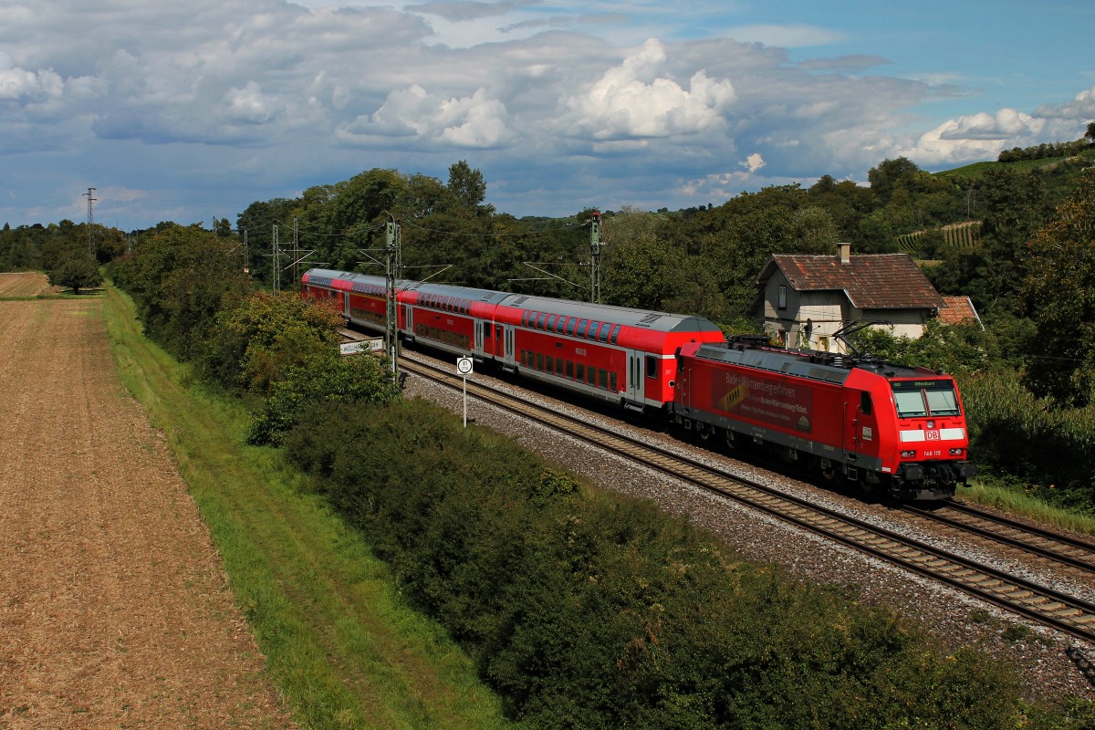 Nachschuss auf einen RE (Schliengen - Offenburg) am 24.08.2014, der mit der Freiburger 146 115  Baden-Württemberg erfahren  in den Bahnhof Müllheim (Baden) fuhr.