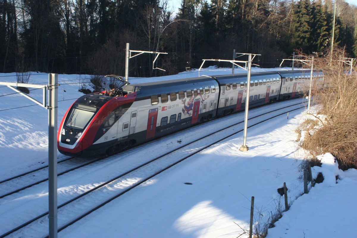 Nachschuss auf den IR 13, der in Form des Twindexx RABDe 502 008  Lausanne Capitale Olympique  soeben den Bahnhof Mörschwil passiert hat und nun gegen Rorschach zustrebt.

Mörschwil, 24.01.2021
