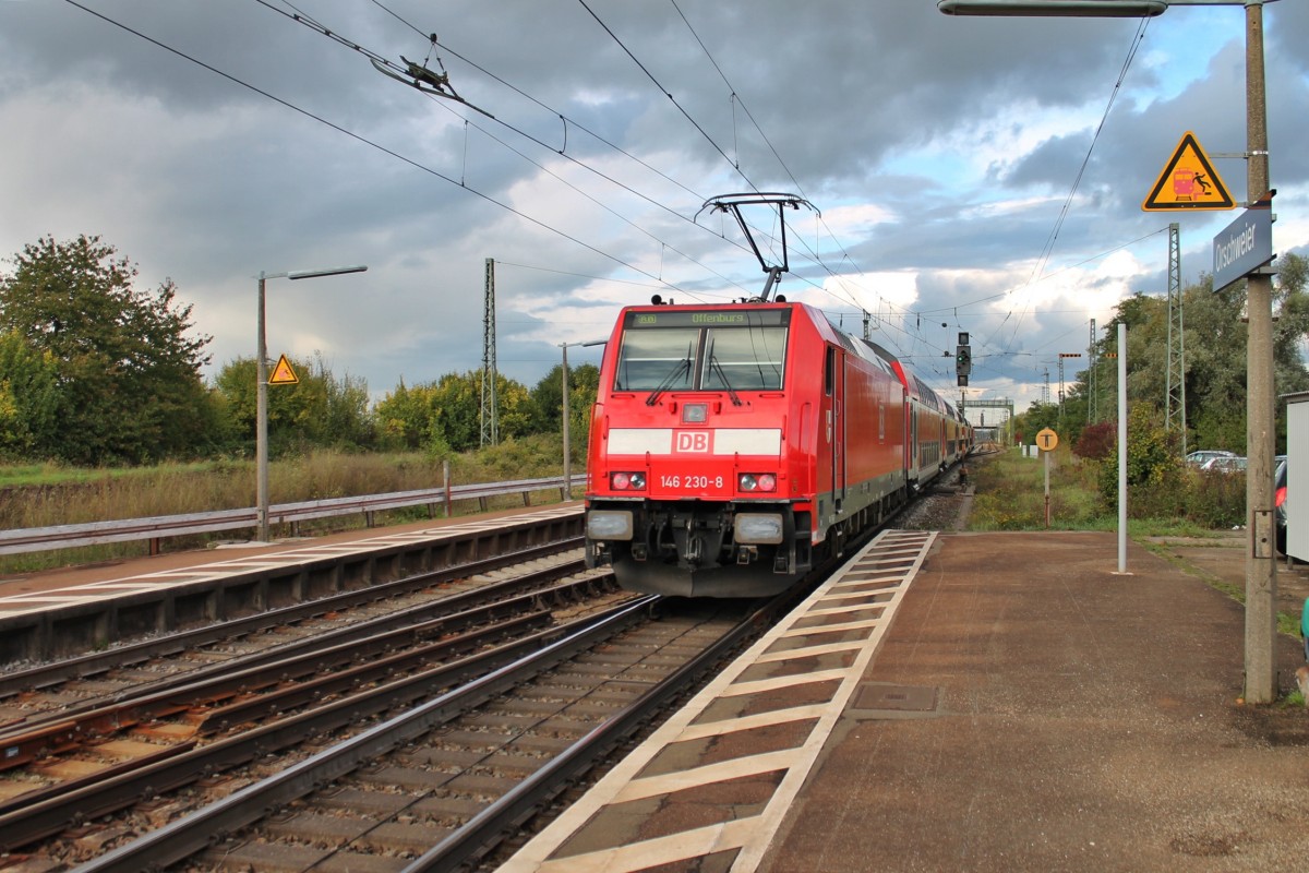 Nachschuss auf die RB 26568 (Neuenburg (Baden) - Offenburg) in au�erplanm��igen Sandwichtraktion mit 146 231-6 (Zugspitze) und der 146 230-8  Radolfzell , als sie aus dem Bahnhof von Orschweier zum n�chsten Halt in Lahr (Schw) fahren.