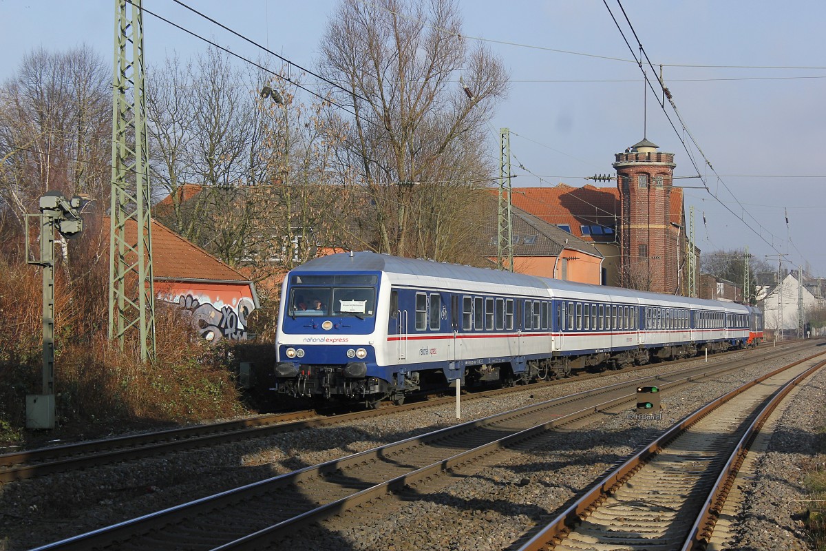National Express RB48 mit dem Wittenberger Steuerwagen und am Schluss des Zuges Hectorrail 242.517 am 21.01.2016 in Wuppertal Unterbarmen. 