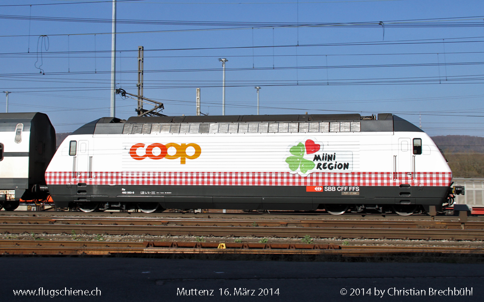 Neuste Werbelok der SBB ist die Re 460 083-9 für COOP Miini Region, hier bei der Vorbeifahrt im Bhf Muttenz am 16. März 2014.