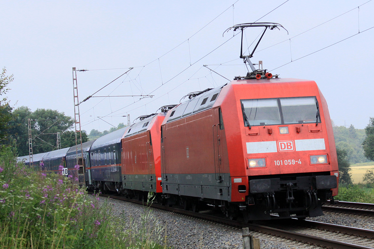 Nightjet der ÖBB mit DB 101 059-4 u. Schwesterlock im Schlepp am 12.07.2019 nördlich von Salzderhelden am Bü 75,1 in Richtung Hamburg