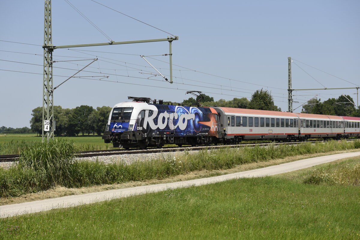 ÖBB 1116 199-1 -Roco Werbelok- auf der Strecke Salzburg in Richtung Kufstein kurz nach Übersee am Chiemsee. Aufgenommen am 22.07.21 