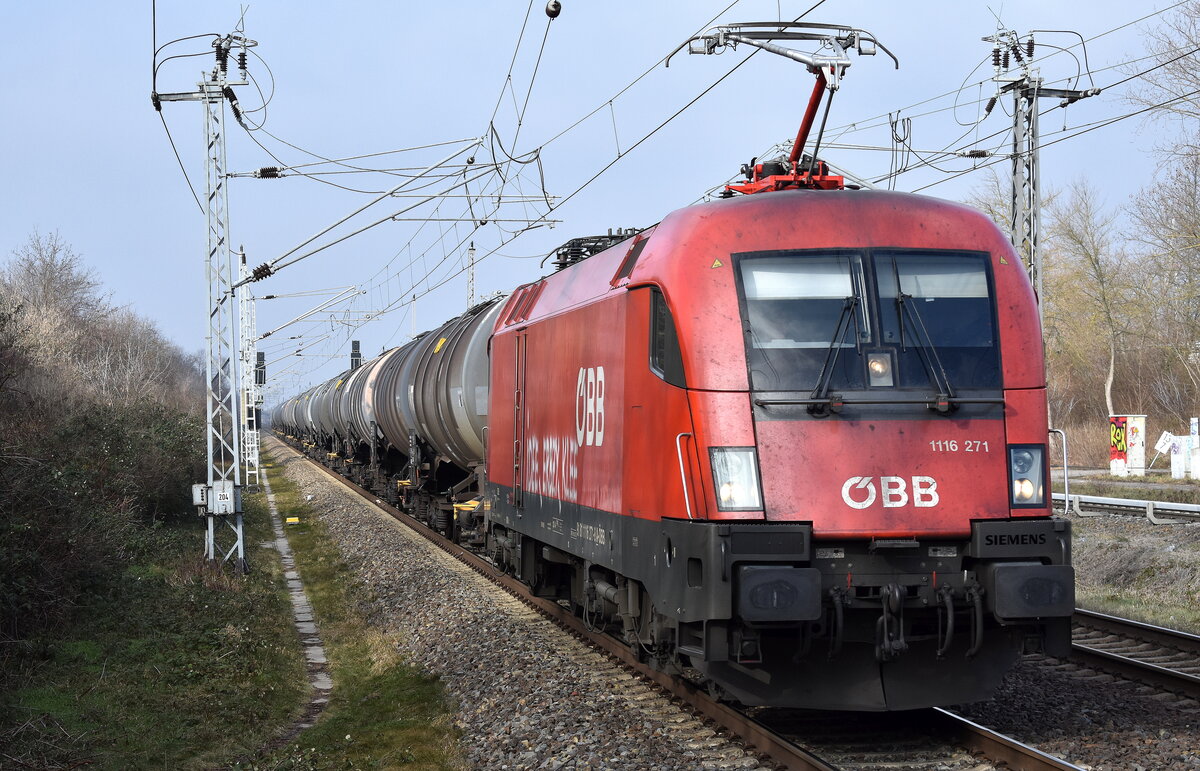 ÖBB - Österreichische Bundesbahnen [A] mit ihrer  1116 271  [NVR-Numer: 91 81 1116 271-8 A-ÖBB] und einem Kesselwagenzug am 10.02.23 Durchfahrt Bahnhof Berlin-Hohenschönhausen.