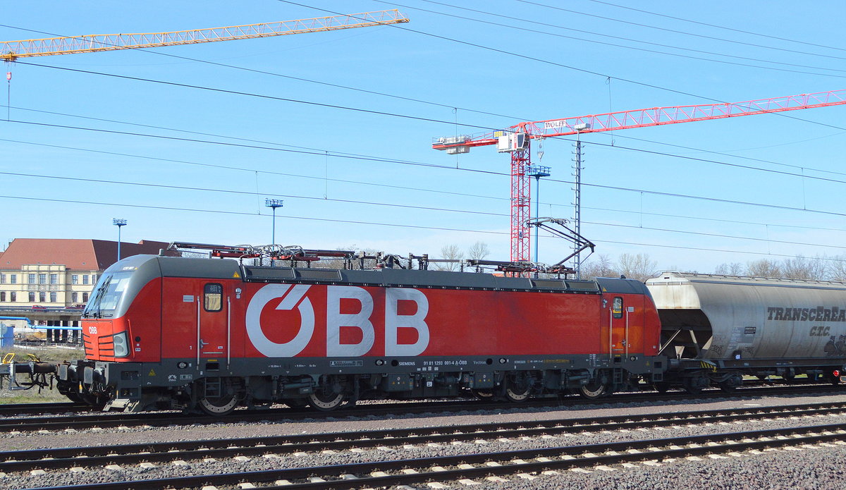 ÖBB-Produktion GmbH, Wien [A] mit  1293 001  [NVR-Nummer: 91 81 1293 001-4 A-ÖBB] und einem Getreidezug am 18.03.20 Magdeburg Hbf.