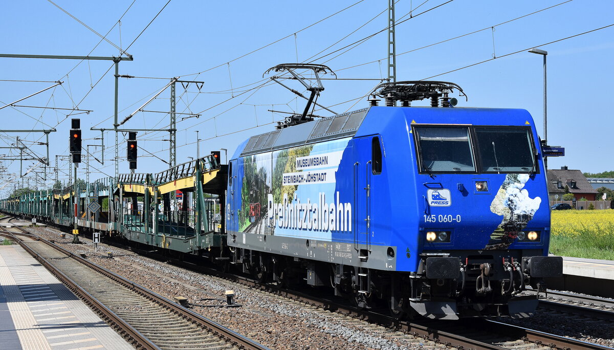 PRESS - Eisenbahn-Bau- and Betriebsgesellschaft Pressnitztalbahn mbH, Jöhstadt [D] mit ihrer  145 060-0  [NVR-Nummer: 91 80 6145 103-8 D-PRESS] und einem PKW-Transportzug (leer) am 30.04.24 Höhe Bahnhof Rodleben.