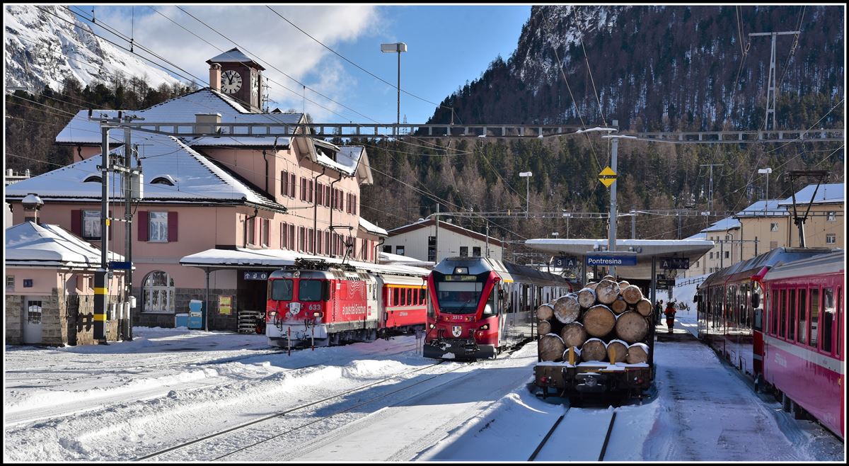 R1944 nach Scuol-Tarasp mit Ge 4/4 II 633  Zuoz  und R1644 nach St.Moritz mit ABe 8/12 3512 in Pontresina. (11.12.2018)