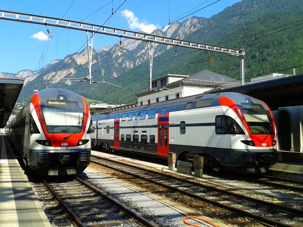RABe 511 038 von Wil und RABe 511 026 nach Wil am 21.7.2015 in Chur. Aufgenommen von Bahnsteig 7
