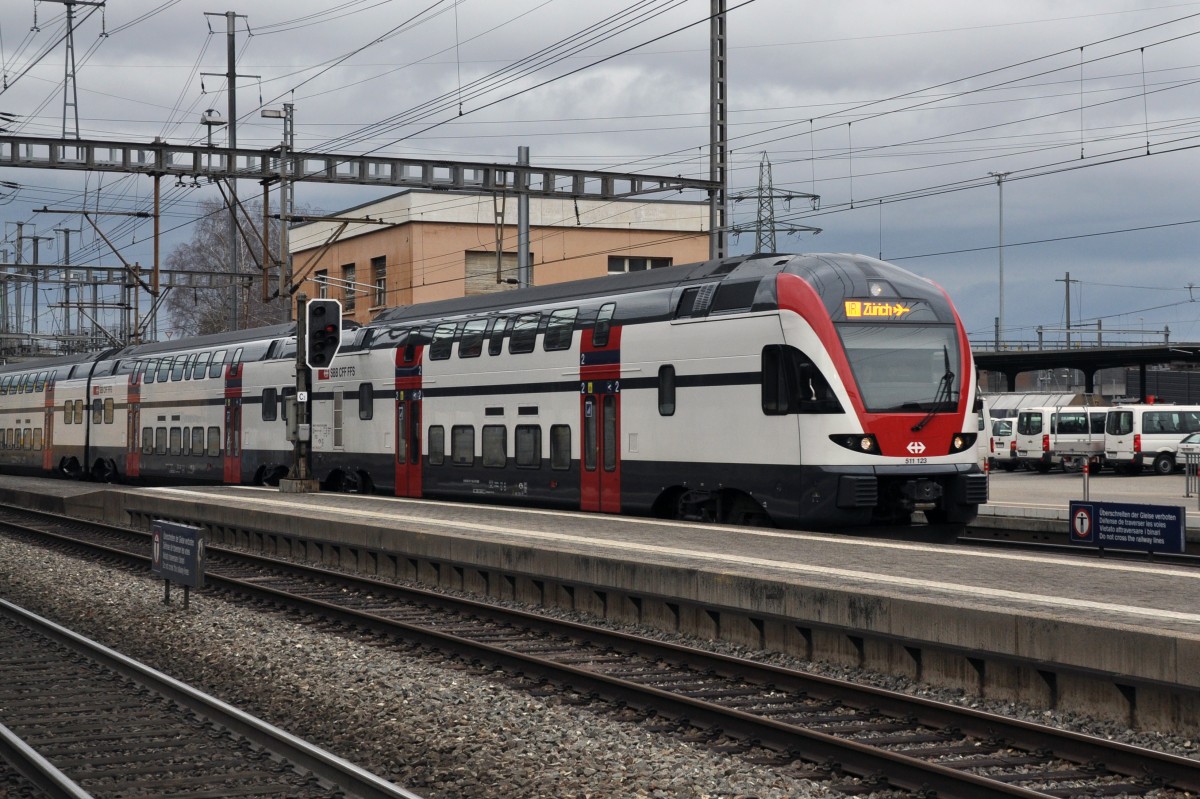 RABe 511 123 durchfährt den Bahnhof Muttenz. Die Aufnahme stammt vom 15.02.2014.