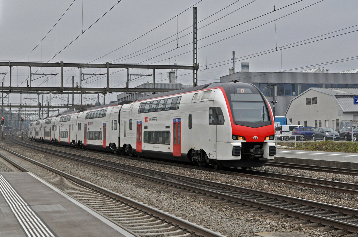 RABe 512 014-7 KISS durchfährt am 17.02.2025 den Bahnhof Rupperswil.