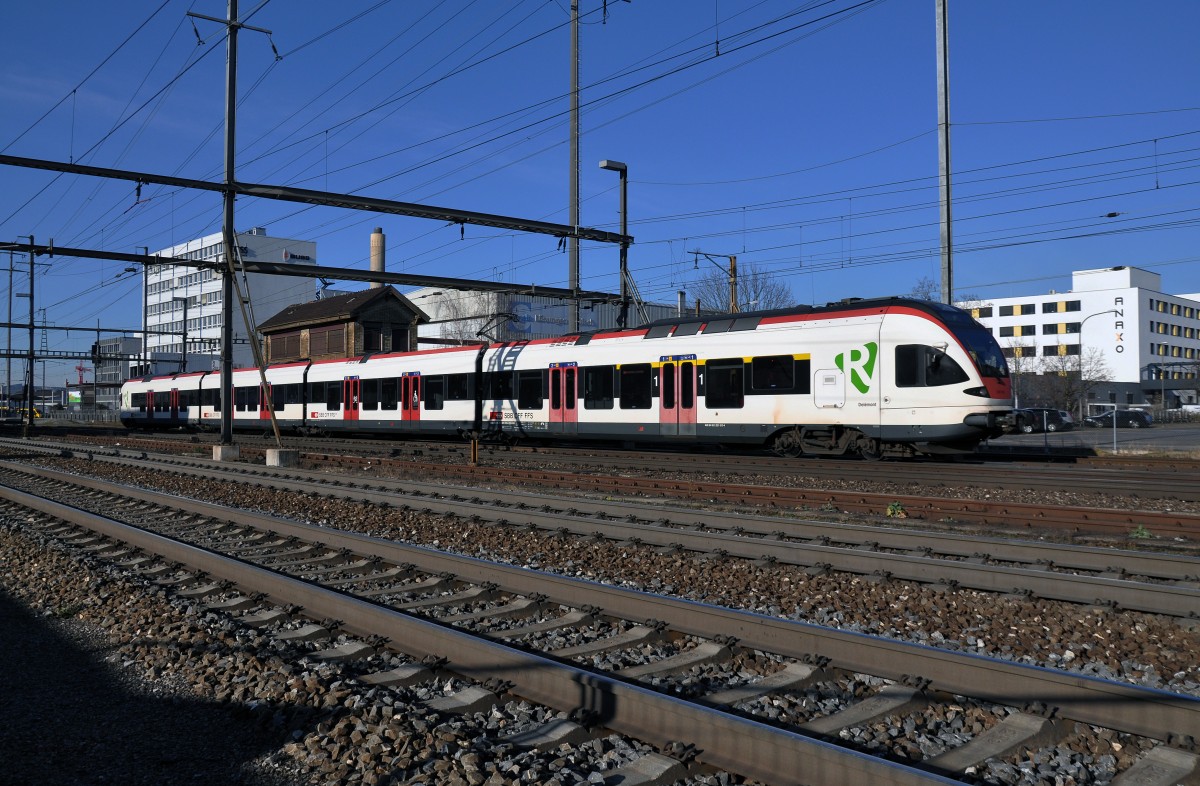 RABe 521 013-4 auf der S1 fährt aus dem Bahnhof Pratteln. Die Aufnahme stamm vom 30.12.2013.