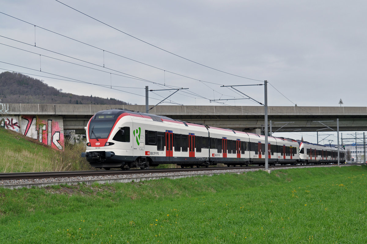 RABe 521 013, auf der S3, fährt Richtung Bahnhof Itingen. Die Aufnahme stammt vom 14.04.2018.