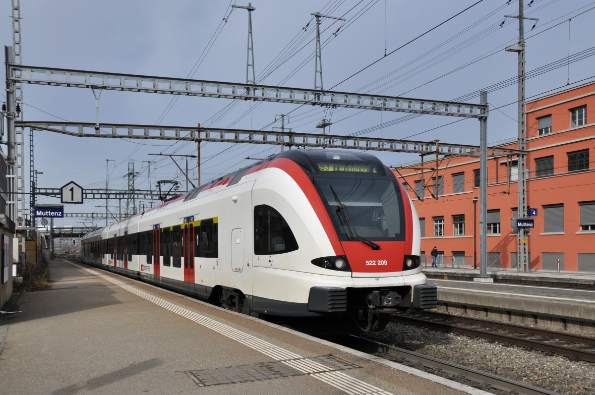 RABe 522 209 auf der S3 fährt in den Bahnhof Muttenz ein. Die Aufnahme stamm vom 12.02.2014.