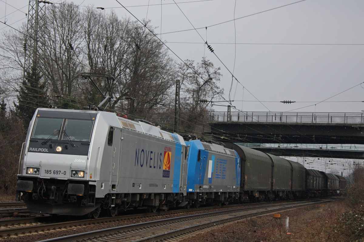 Railpool/Brunert 185 697 zog am 30.3.13 die LTE 185 529  Michaela  und den Nievenheimer durch Oberhausen-Osterfeld Sd.