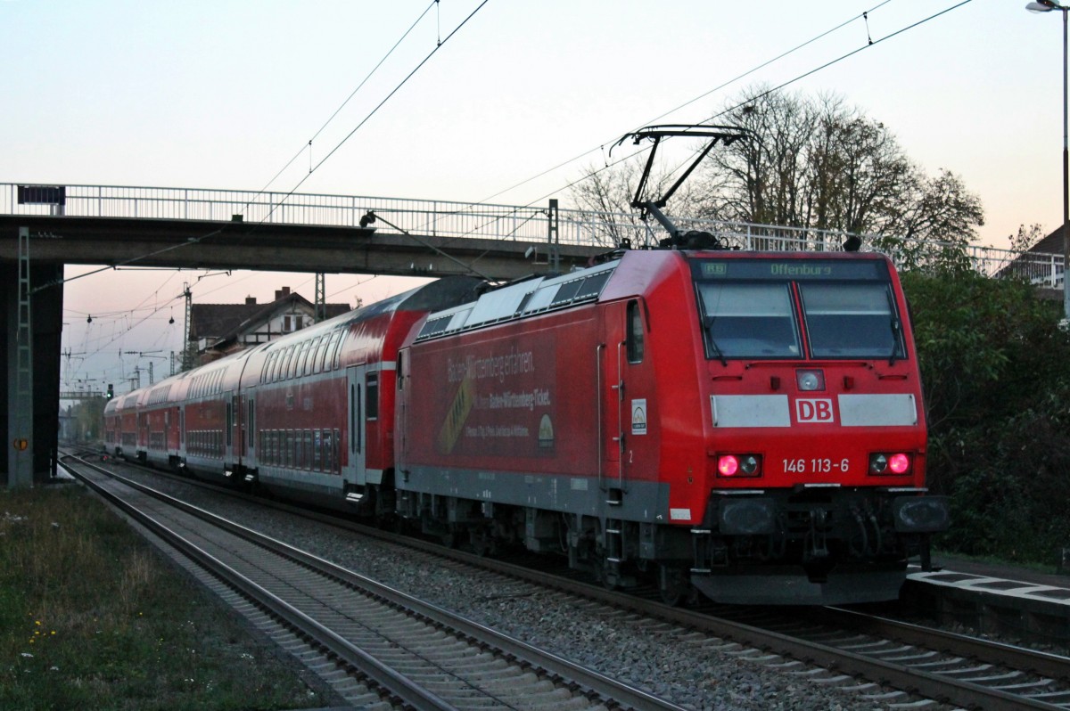 RB 26574 (Basel Bad Bf - Offenburg) am 31.10.2013 mit der Freiburger 146 113-6  Baden-W�rttemberg erfahren  beim Zwischenhalt in Orschweier.