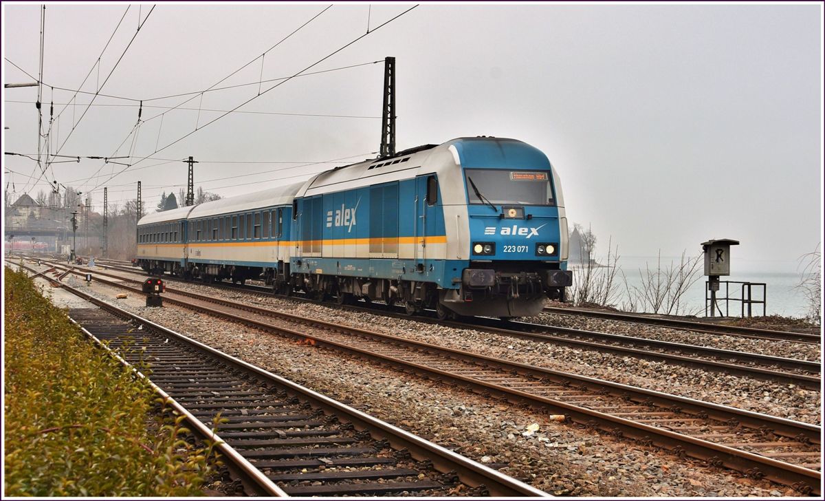 RB84139 mit 223 071 nach München verlässt Lindau Hbf (14.02.2017)