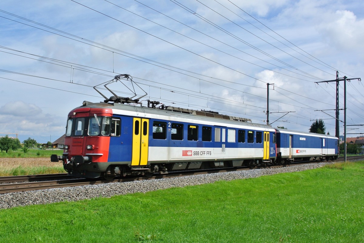 RBe 540 034-6 und St 50 85 89-33 901-1 als Jail-Train bei Lyssach, 08.08.2014.