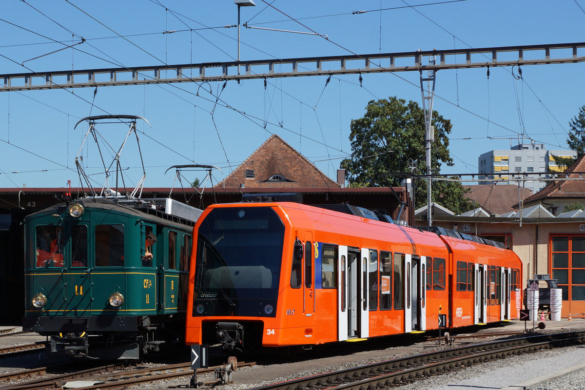 RBS/SZB:
100 JAHRE SOLOTHURN-BERN
Das älteste und das neuste Triebfahrzeug vor dem Depot Solothurn am 25. August 2016.
Foto: Walter Ruetsch