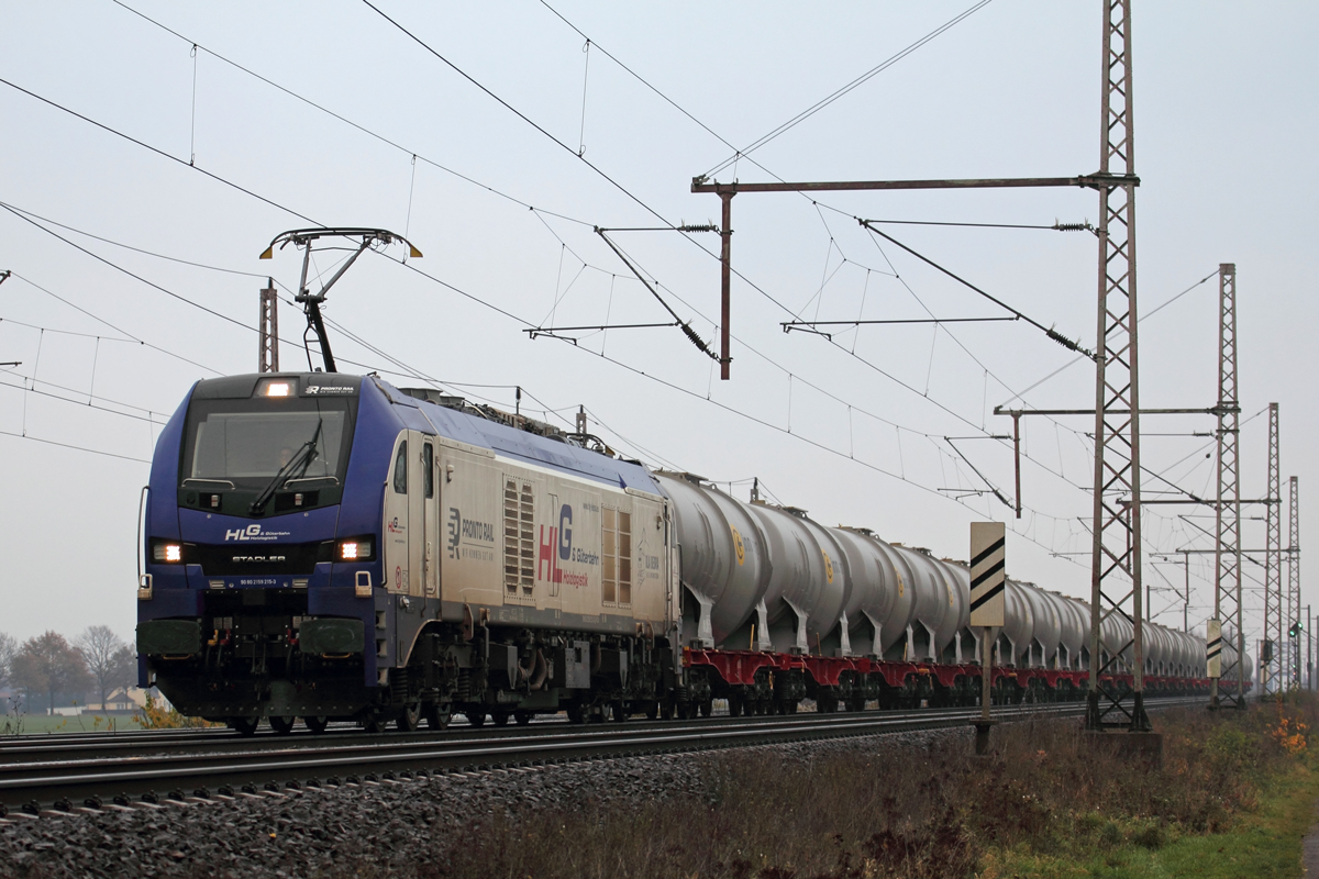 RCM 159 215-3 unterwegs für HLG in Dedensen-Gümmer 25.11.2021