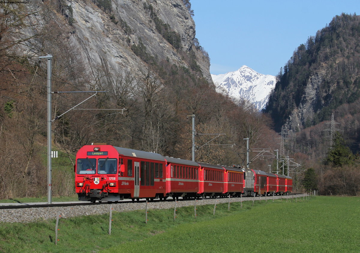 RE 1052 (Davos Platz-Landquart) mit Schublok 624 bei Malans 31.3.19